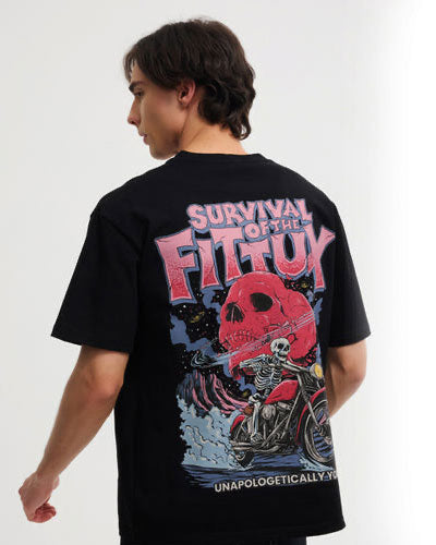 a model wearing a Fittux t-shirt. Survival of the Fittux written on the back.