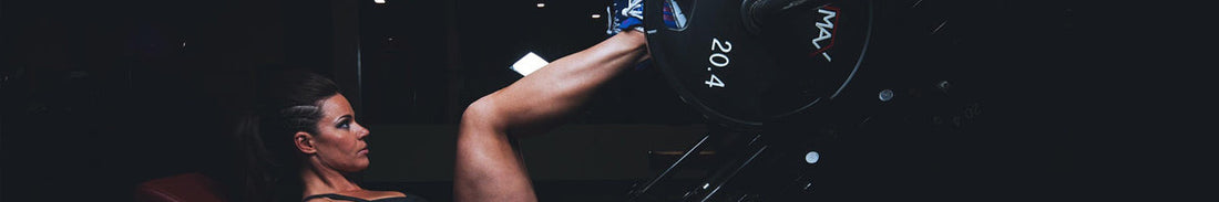 A woman pushing weights with her legs.
