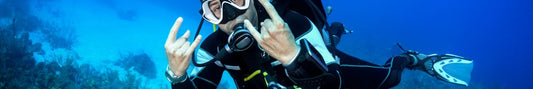 A scuba diver wearing a diving watch.
