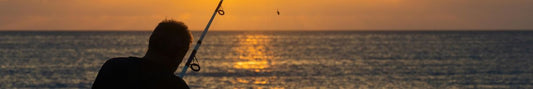 A fisherman fishing.