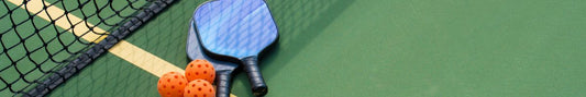 Two pickleball paddles.