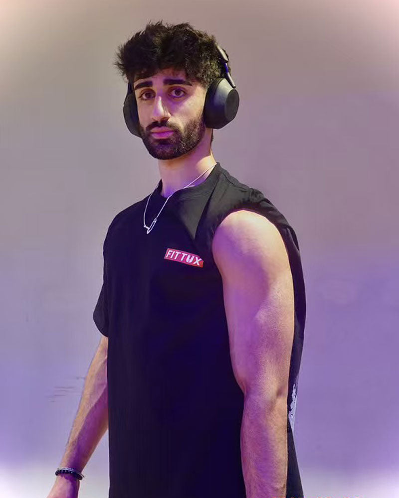 Moody wearing our Fittux Survival of the Fittux reverse printed t-shirt. 